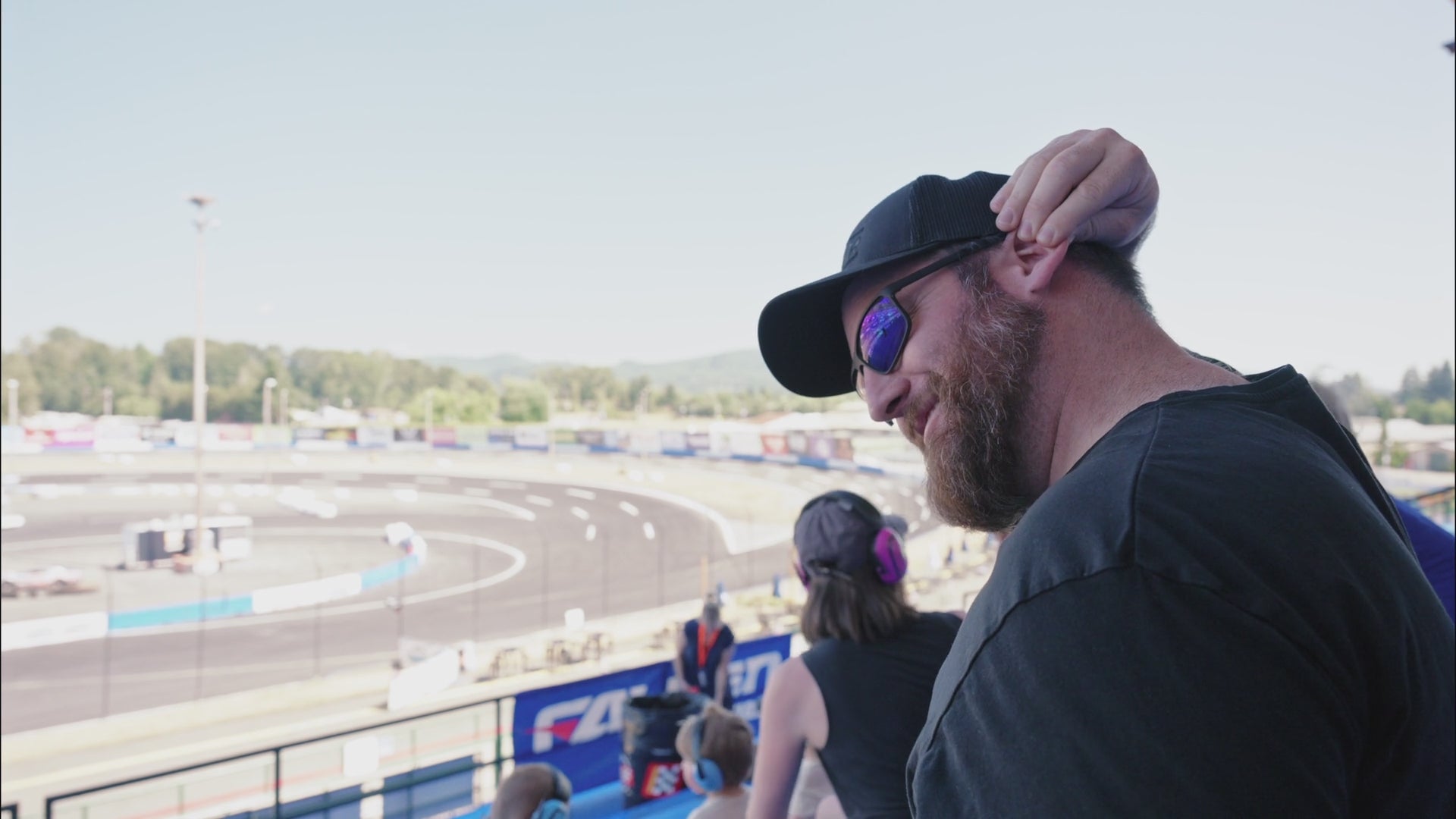 Load video: Demonstration of how to properly insert push-to-fit earplugs for safe hearing protection — U.S. guide for racers and workers.